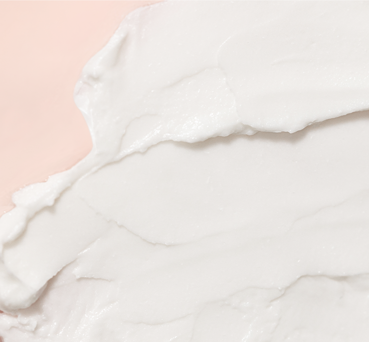 RESTORE24 cream on a peach background