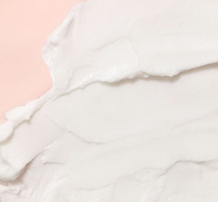 RESTORE24 cream on a peach background